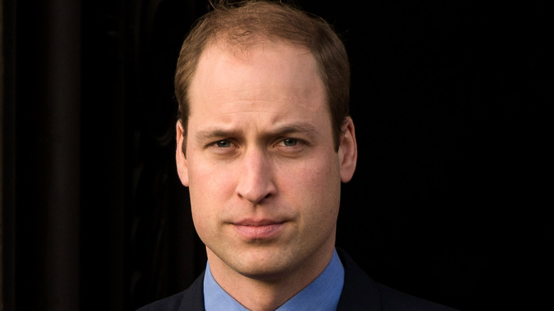 William, Prince of Wales looking serious in close-up