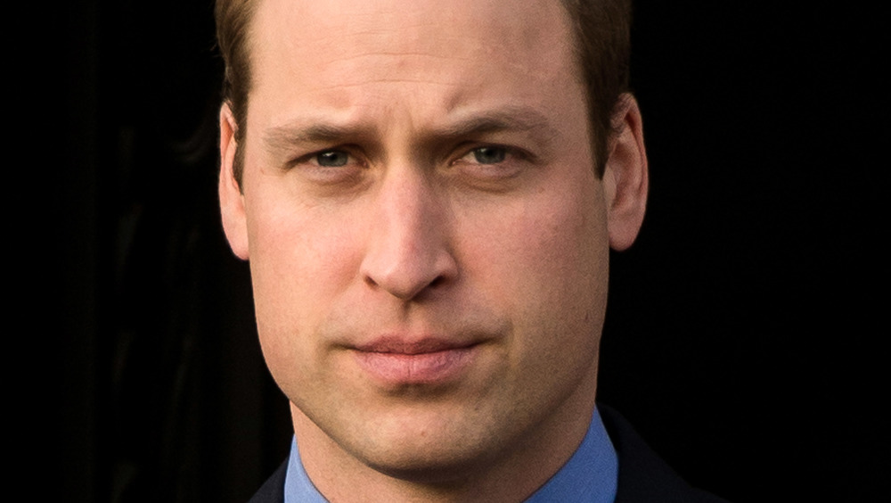 Prince William looking at the cameras with a furrowed brow