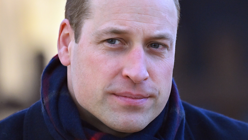 Prince William with a neutral expression