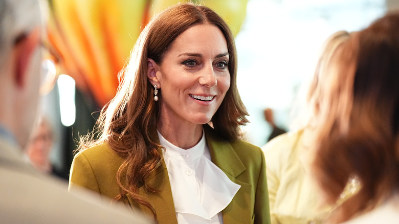 Kate Middleton chatting with a crowd