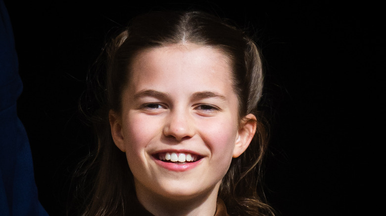 Princess Charlotte smiles updo hairstyle