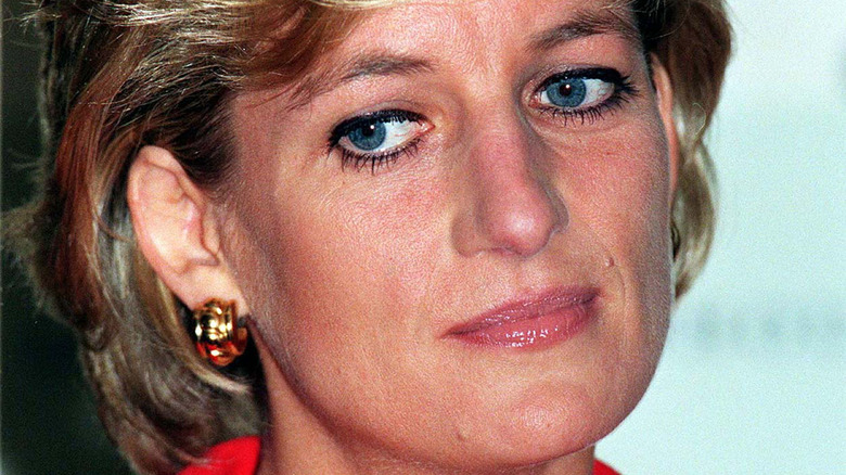 Princess Diana looking off to the side