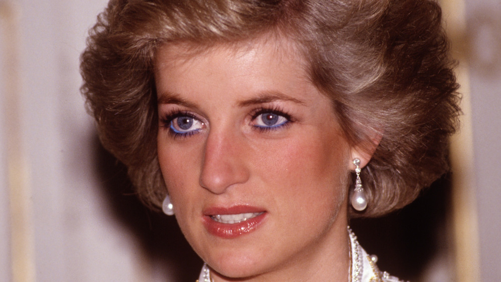 Princess Diana staring with a serious expression