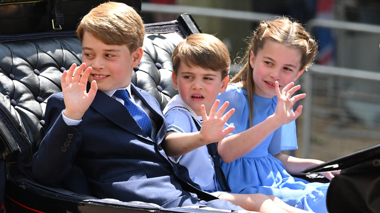 Prince George, Charlotte, and Louis waving
