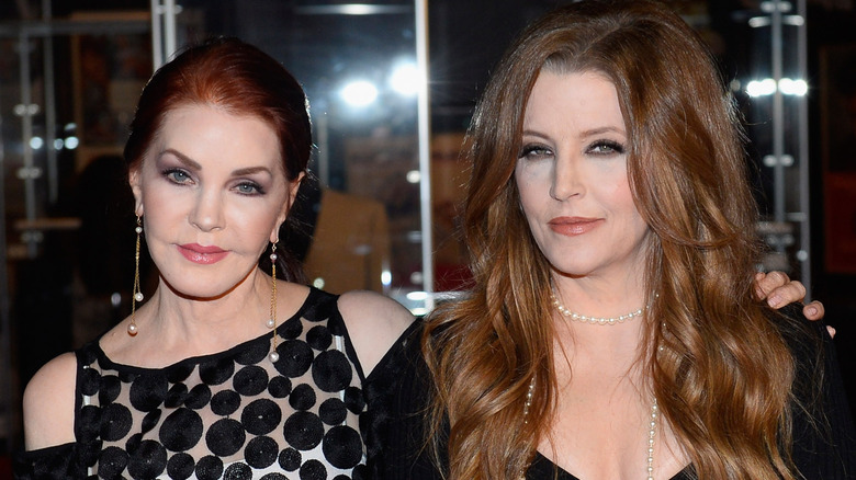 Priscilla and Lisa Marie Presley posing