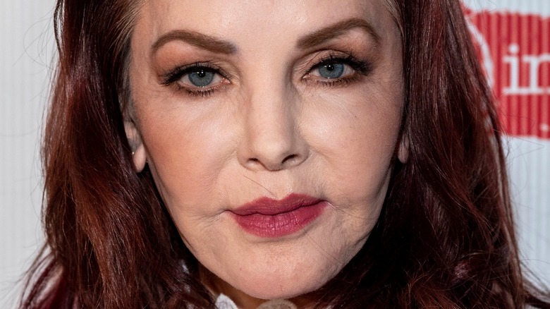 Priscilla Presley red lipstick