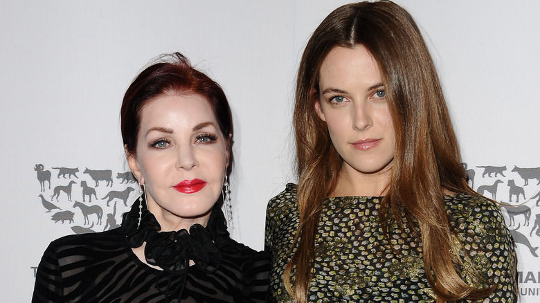 Priscilla Presley and Riley Keough posing 