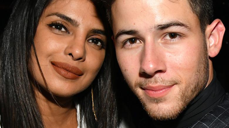 Priyanka Chopra, Nick Jonas leaning heads together