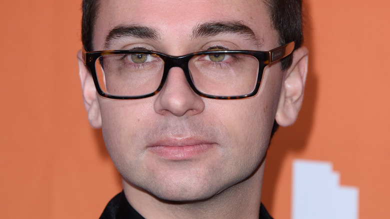 Christian Siriano looking to the side with serious expression