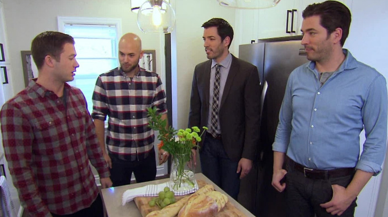 Scott and Trevor with Property Brothers on Brothers Helping Brothers episode