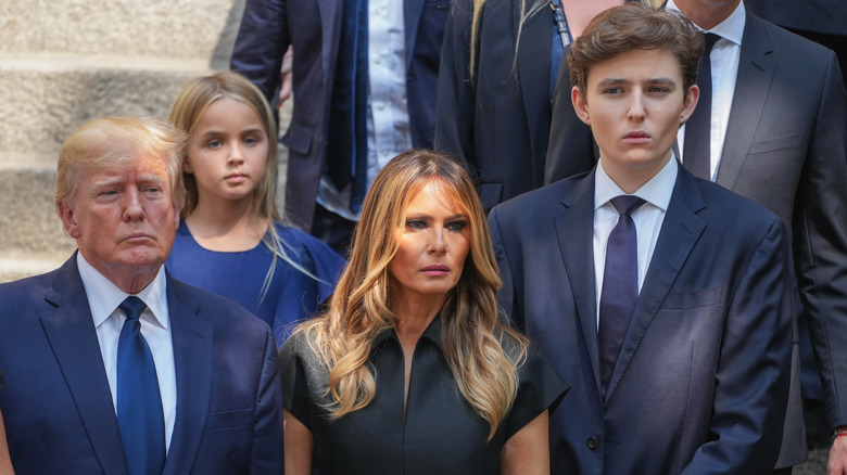 Donald, Melania, and Barron Trump serious