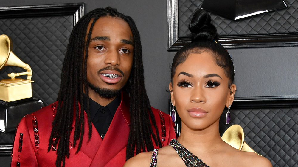 Quavo and Saweetie posing together