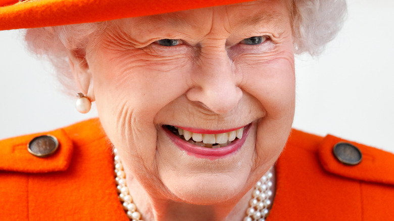 Queen Elizabeth smiles