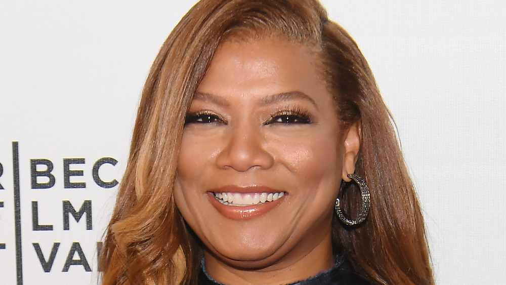 Queen Latifah smiling on the red carpet