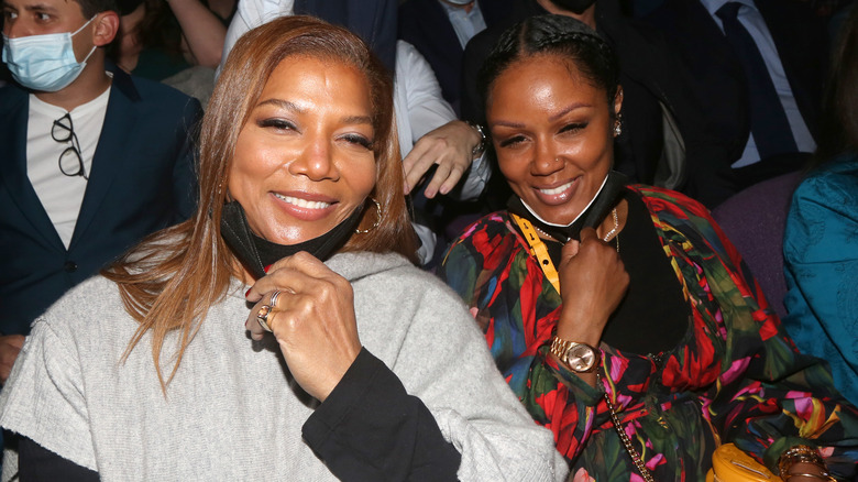 Queen Latifah, Eboni Nichols seated in audience