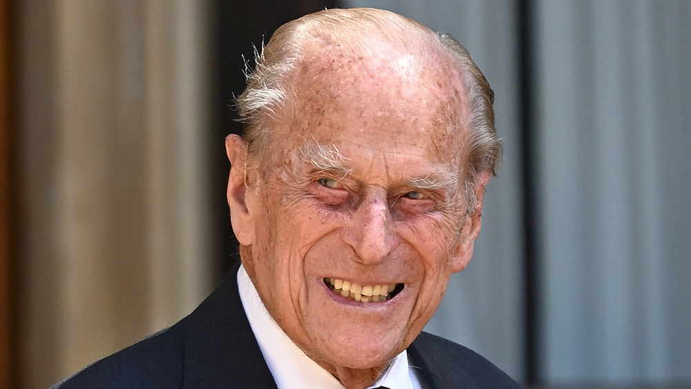 Prince Philip outside smiling