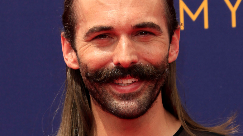 Jonathan Van Ness smiles on the red carpet