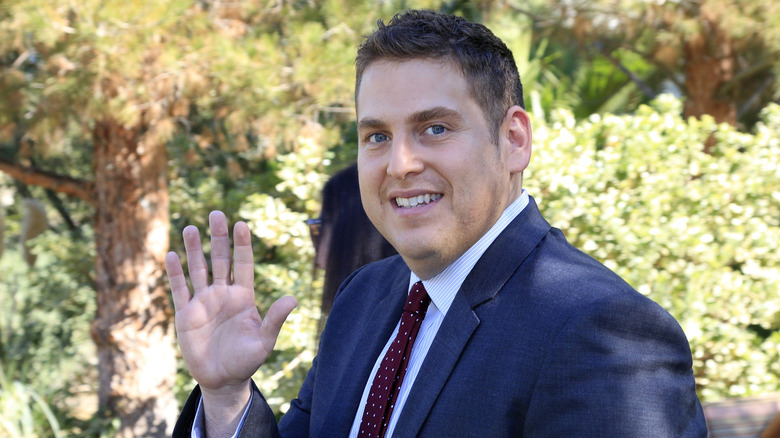 Jonah Hill waving