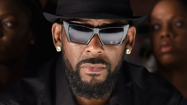 R. Kelly wearing sunglasses