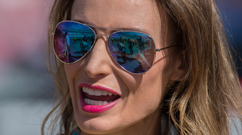 samantha busch in sunglasses speaking