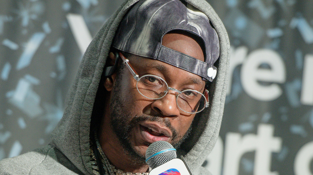 2 Chainz holding microphone