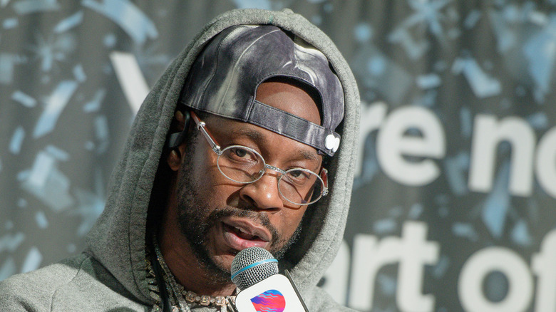 2 Chainz holding microphone