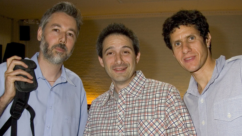 Beastie Boys holding backpack