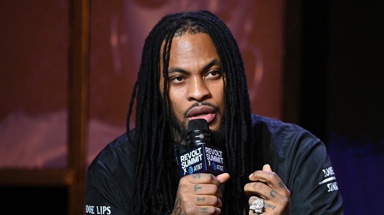 Waka Flocka Flame holding mic