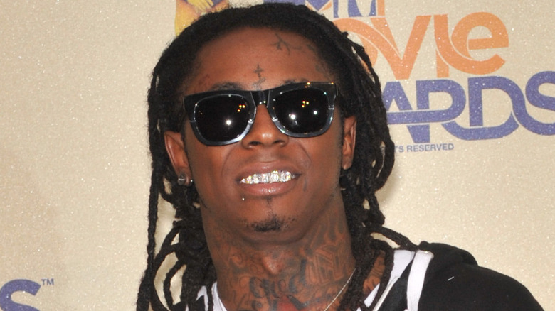 Lil Wayne wearing dark shades