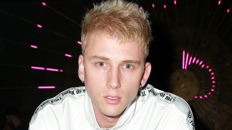 Machine Gun Kelly wearing white