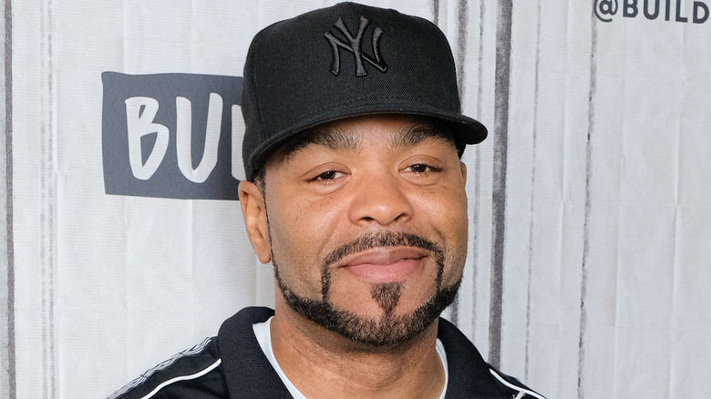 Method Man wearing a black New York Yankees cap