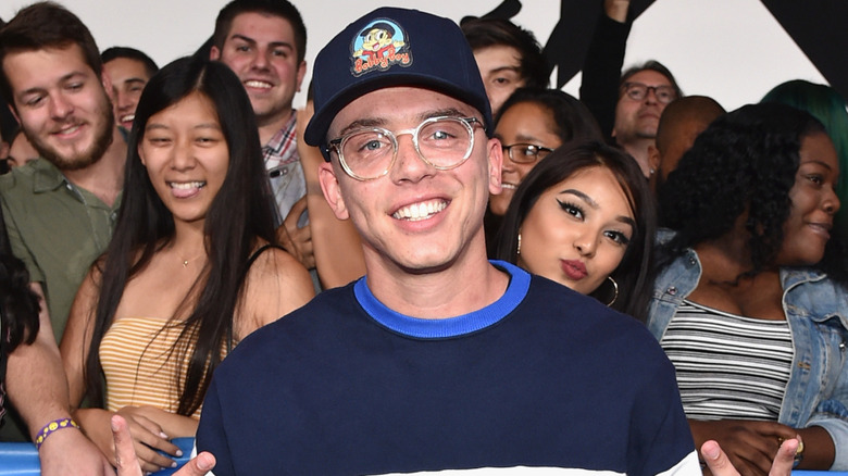 Logic posing with his fans