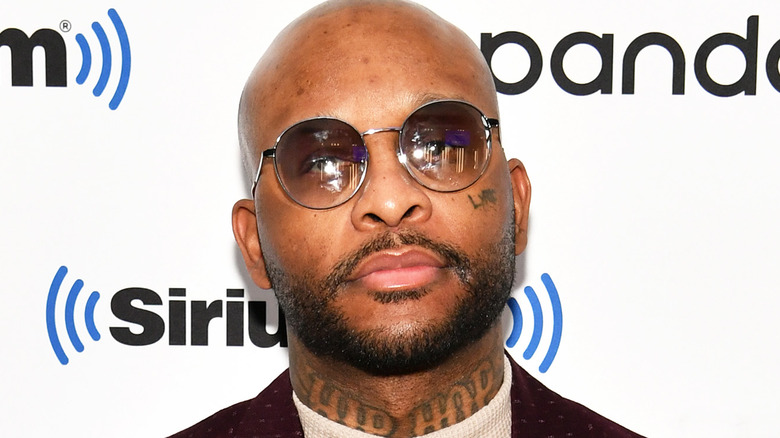 Royce Da 5'9" wearing sunglasses 