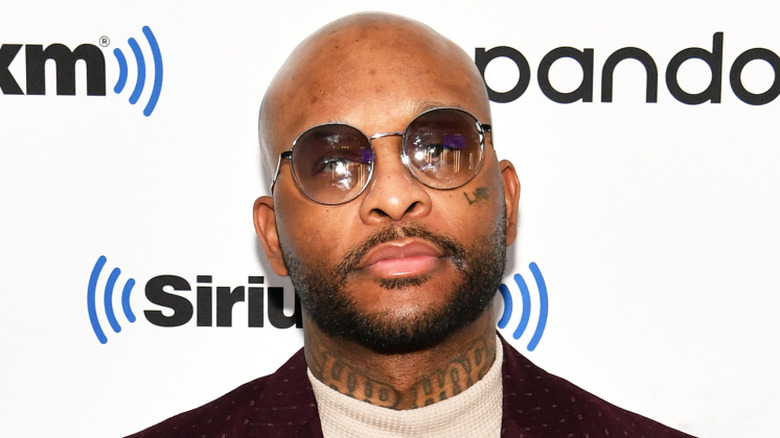 Royce Da 5'9" wearing sunglasses