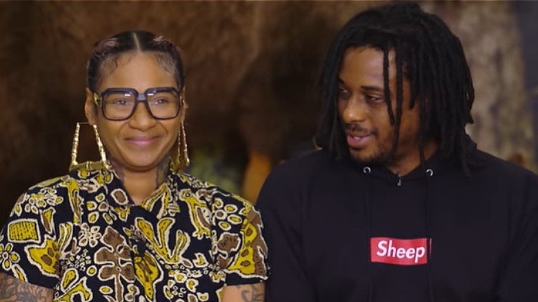 Quelle Chris and Jean Grae pose