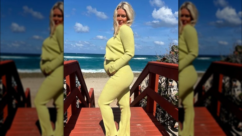 Pregnant Karoline Leavitt posing in a spring green set.