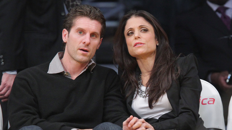 Jason Hoppy and Bethenny Frankel at a basketball game