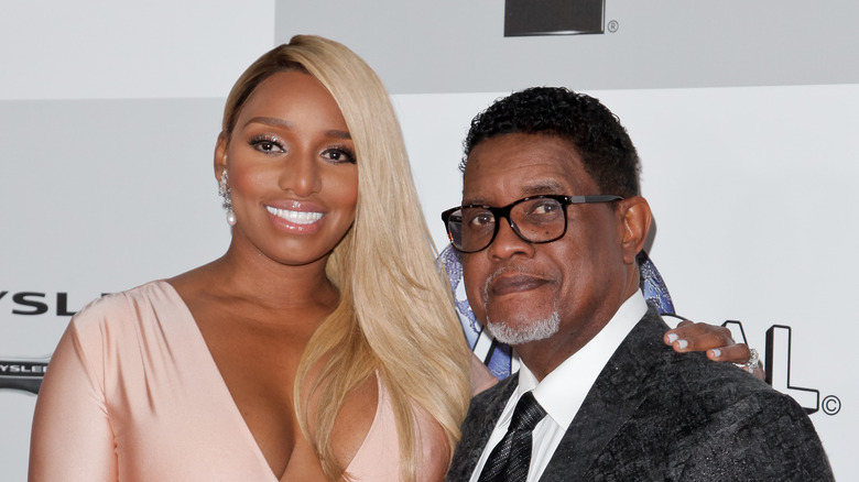 Nene Leakes and Gregg Leakes posing at an event