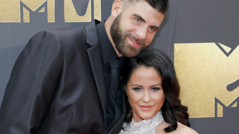 David Eason with his arm around Jenelle Evans
