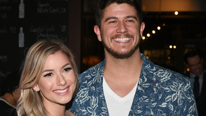 Amber Pike and Matt Bartlett posing at an event