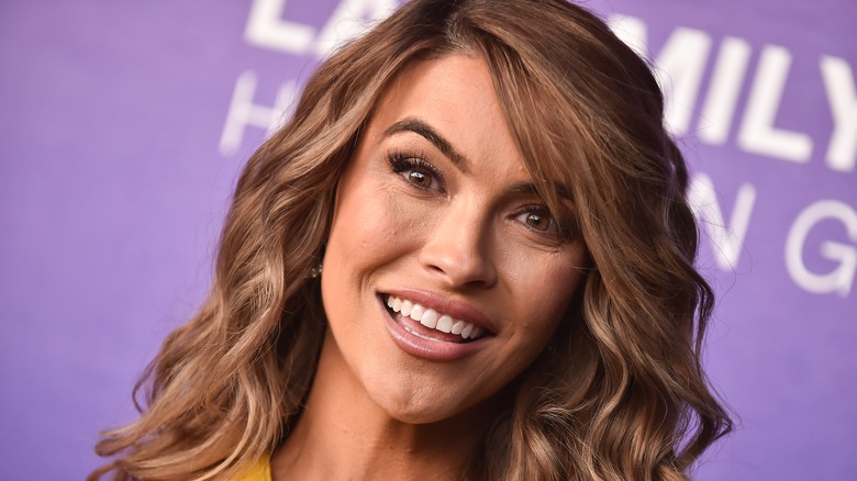 Chrishell Stause posing at an event