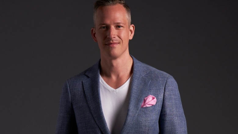 Jeremy Hartwell posing in a suit