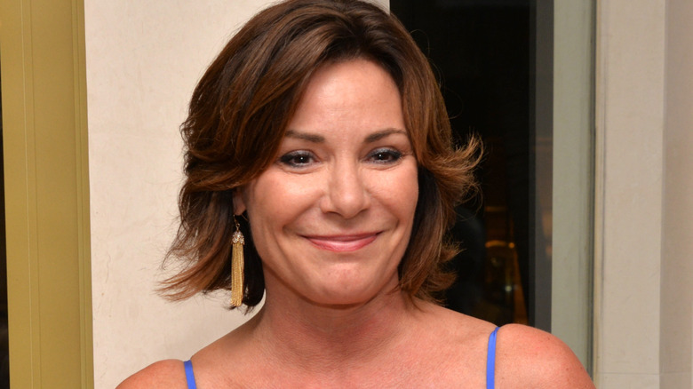Luann de Lesseps smirking
