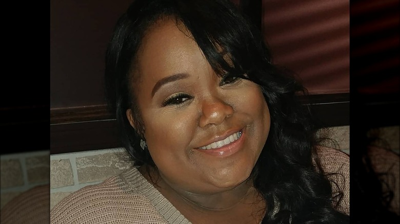 Ashley "Minnie" Ross smiling