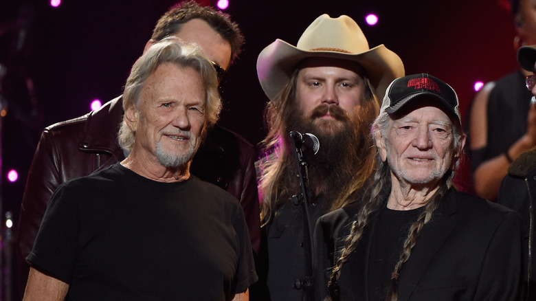 Kris Kristofferson, Chris Stapleton, and Willie Nelson on stage