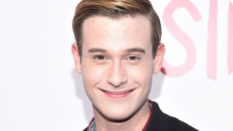 Hollywood Medium's Tyler Henry smiles