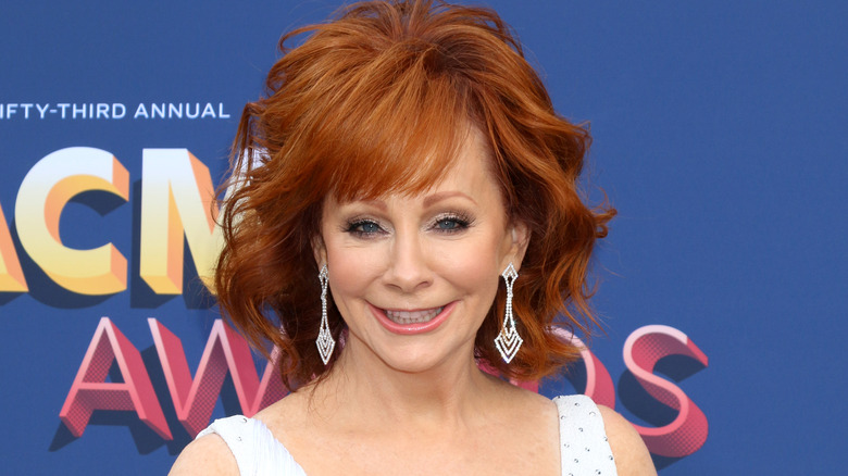 Reba McEntire smiles