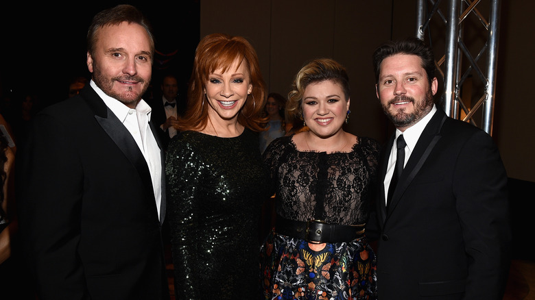 Reba McEntire and Brandon Blackstock pose 