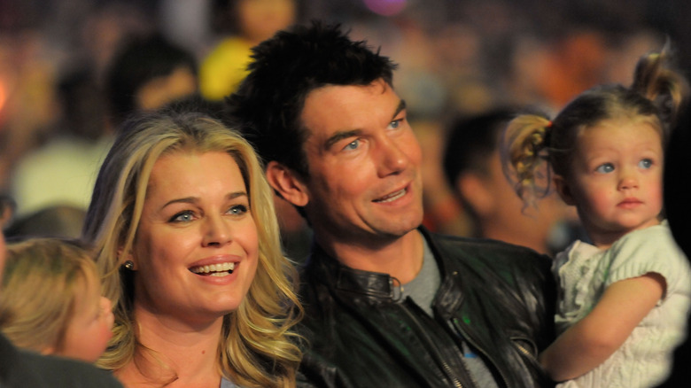 Rebecca Romijn and Jerry O'Connell hold twin daughters in 2010