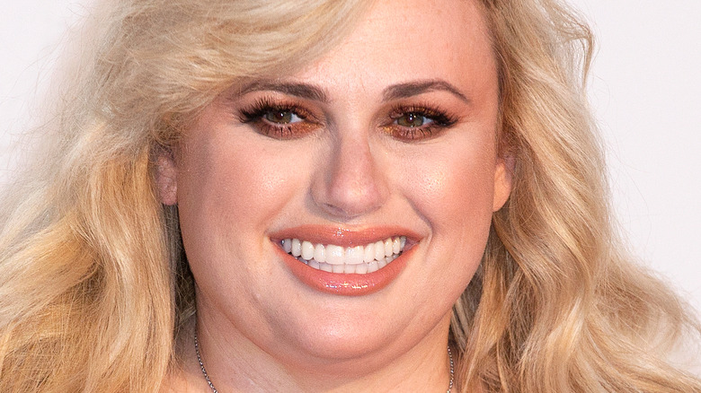 Rebel Wilson smiling at event